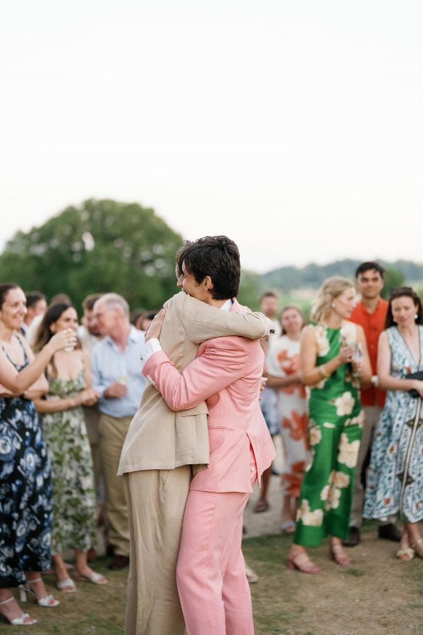people hugging after speeches