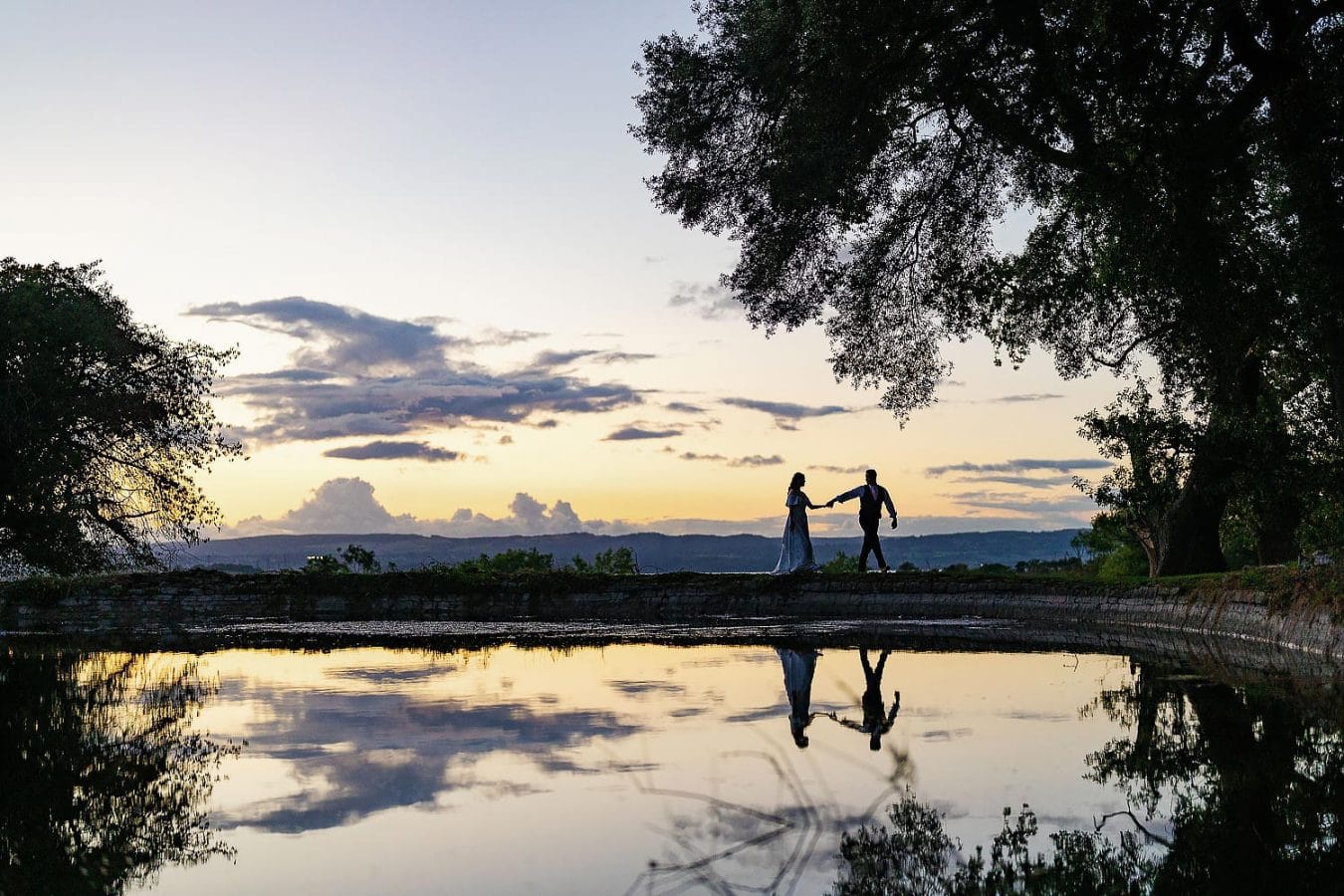 couple photos by old down estate lake