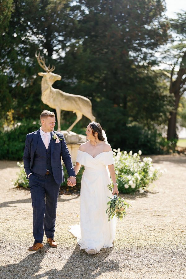 bride and groom in the grounds of old down estate