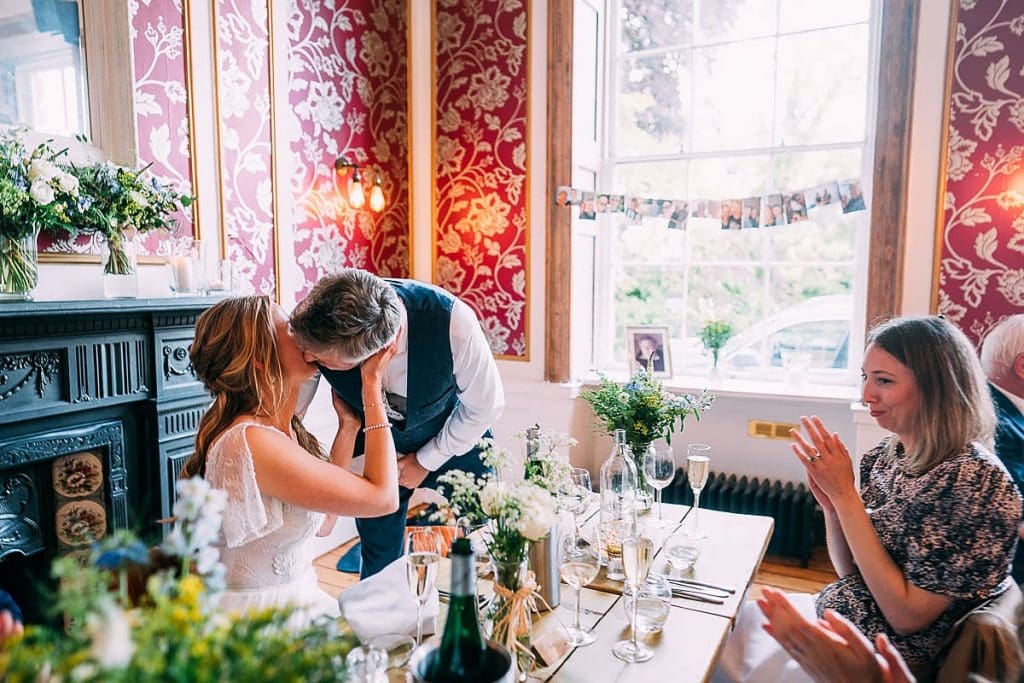 bride and groom kiss