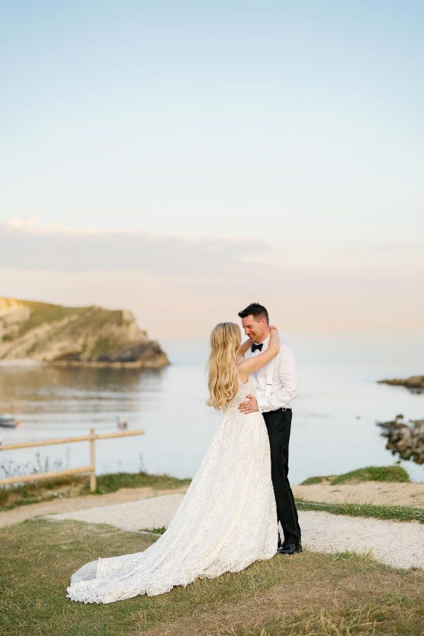 wedding photoshoot at Lulworth cove