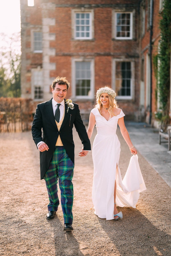 bride and groom outside St Giles House