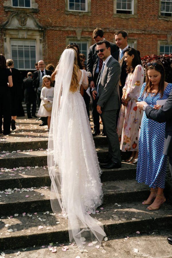 brides veil in sunny wedding photo