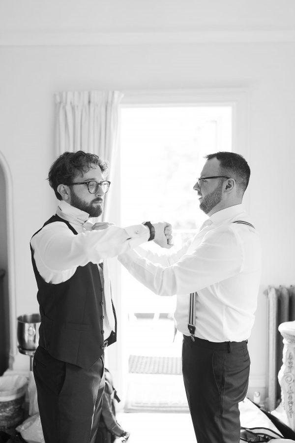 groom getting ready inside Berwick Lodge