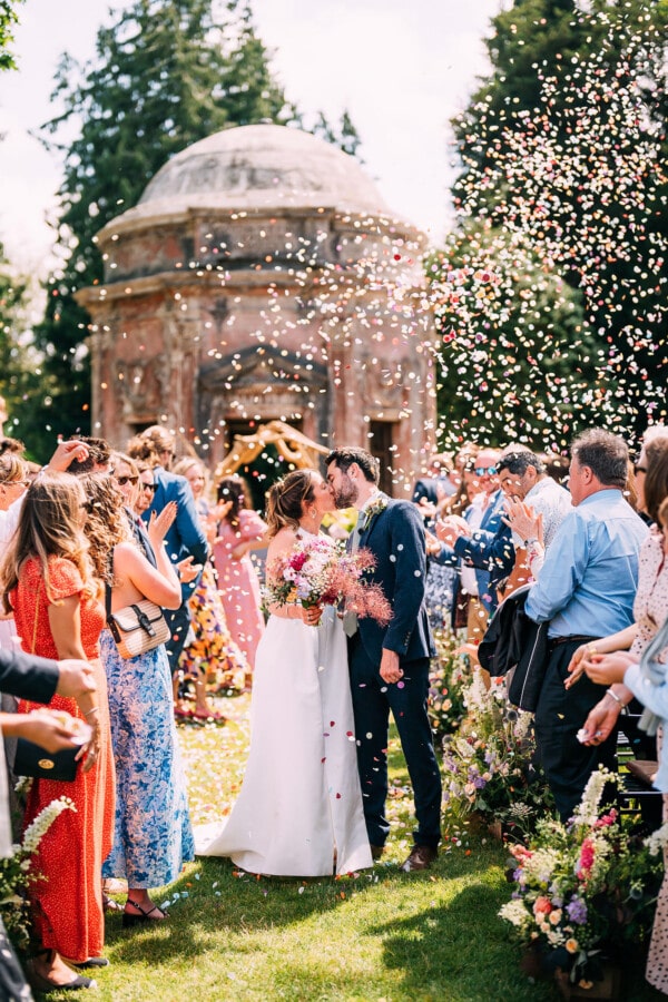 confetti photo at Larmer Tree Gardens summer wedding