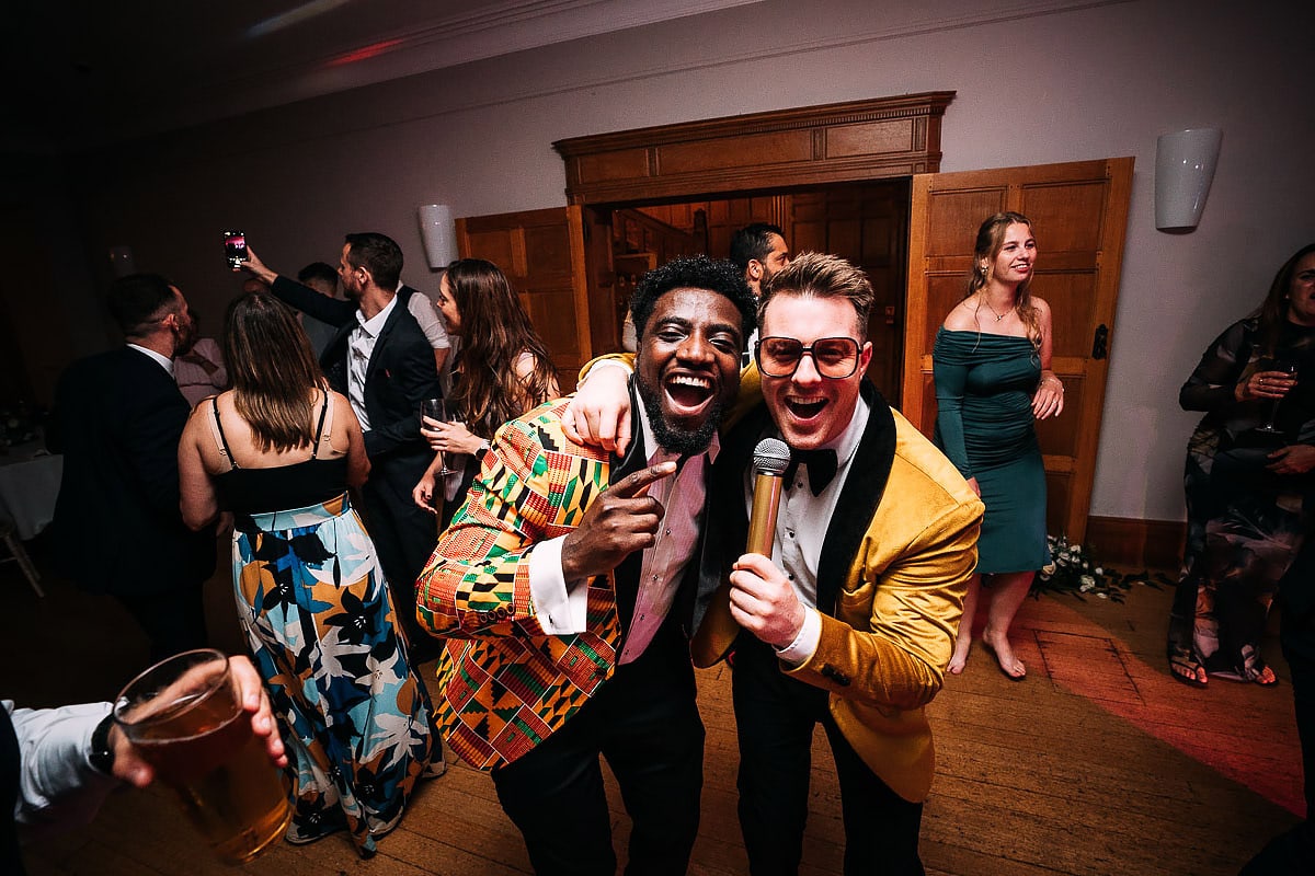 groom singing with Tux Fizz band