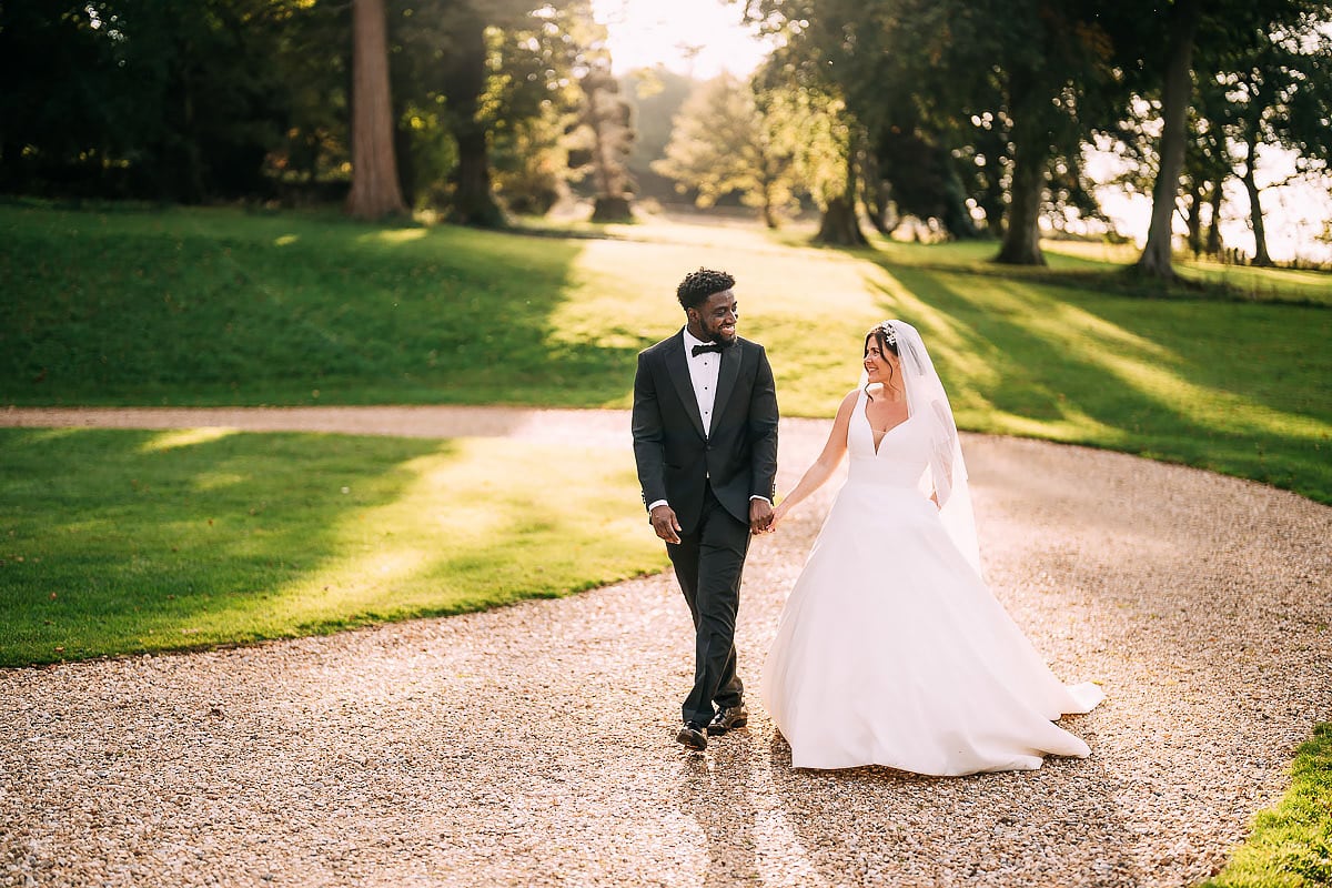 bride and groom walking together 