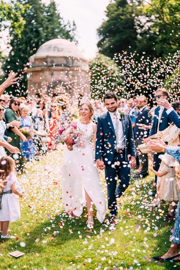 confetti photo at Larmer Tree Gardens summer wedding