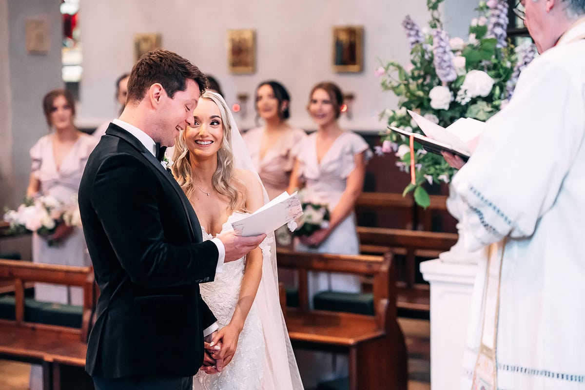 bride looking at groom in wedding ceremony