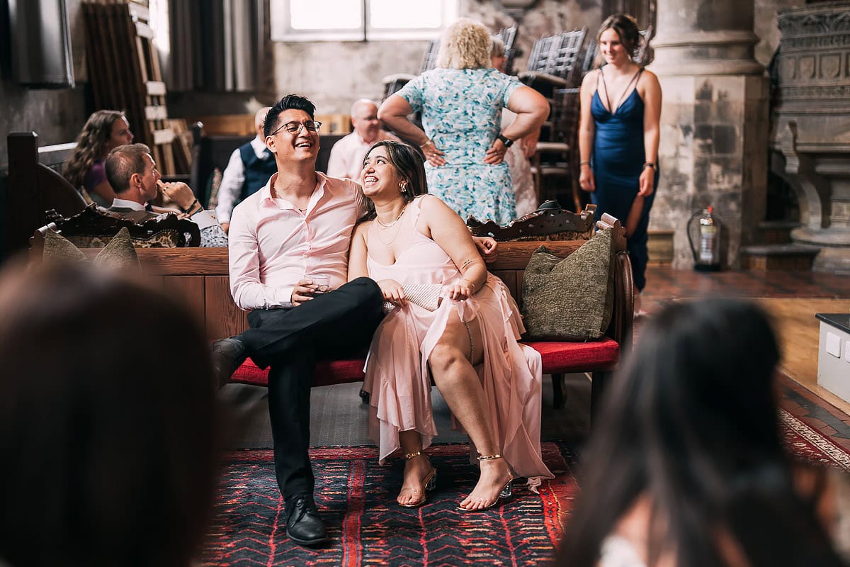 wedding guests relaxing inside
