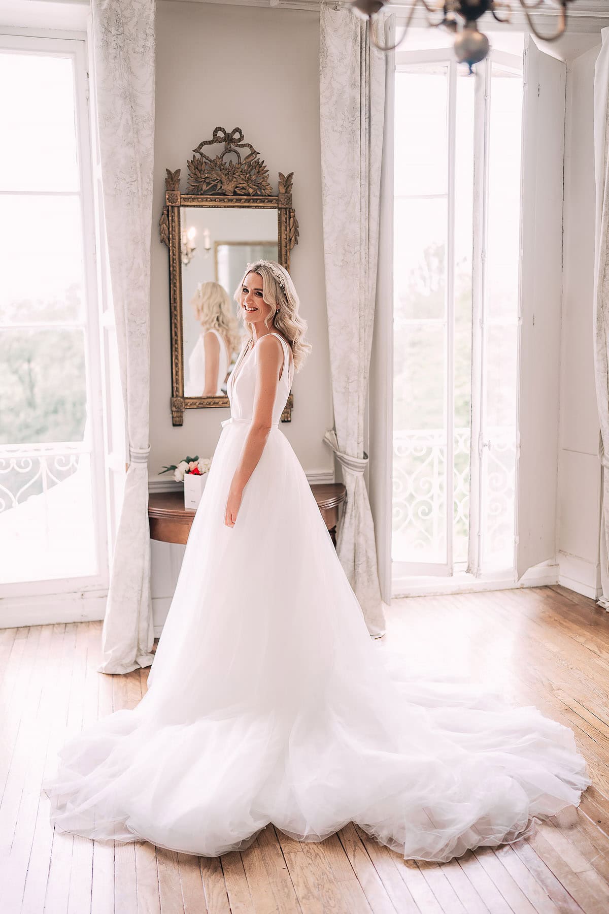 bride looking in mirror 