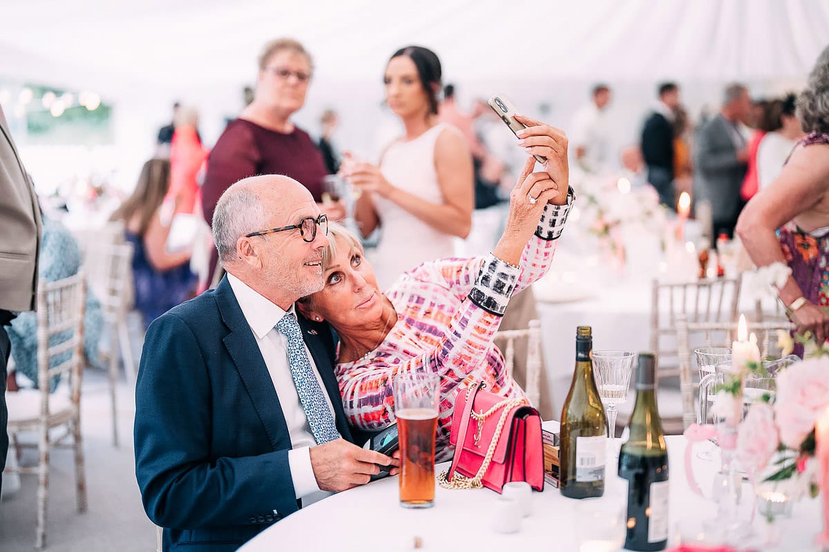 wedding guests taking a Delphine