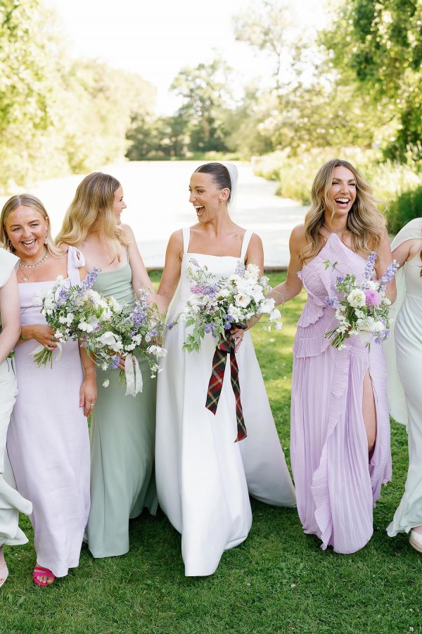 bride and friends laughing at deans court wedding