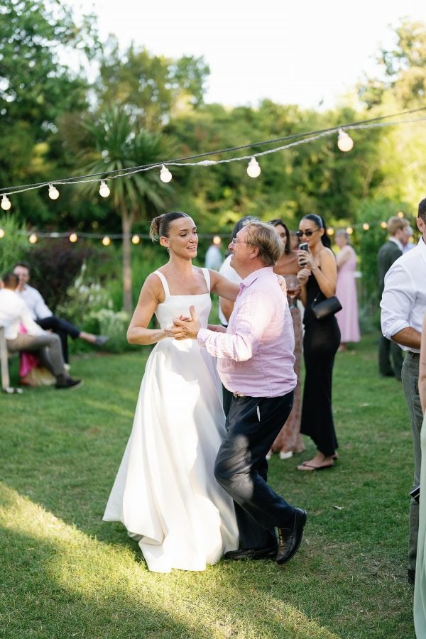 bride dancing outside