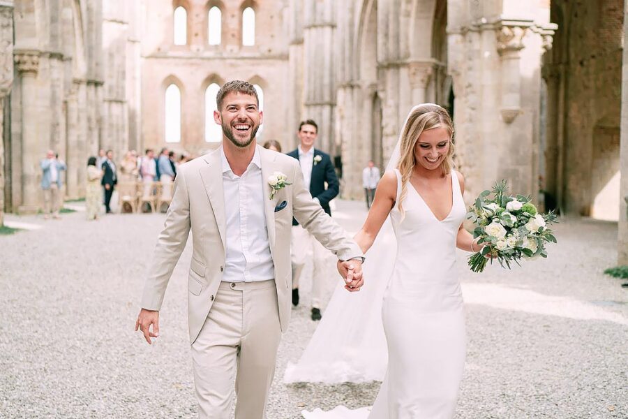 bride and groom walking out of the ceremony
