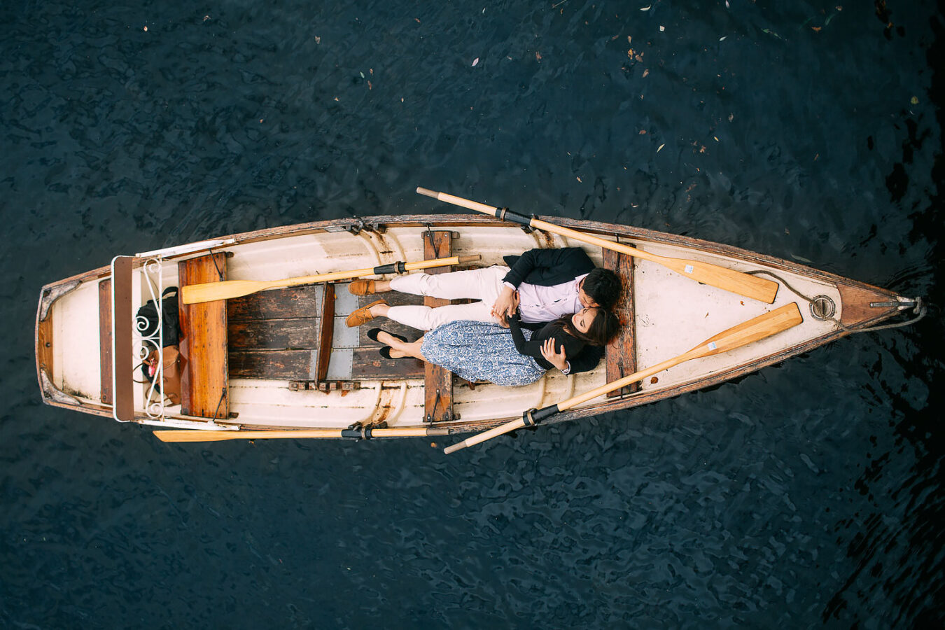 couple in a boat engagement shoot