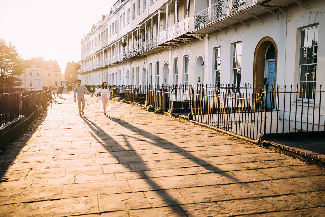 couple walking together at sunrise