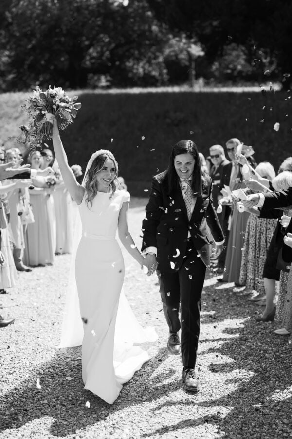 two brides in confetti