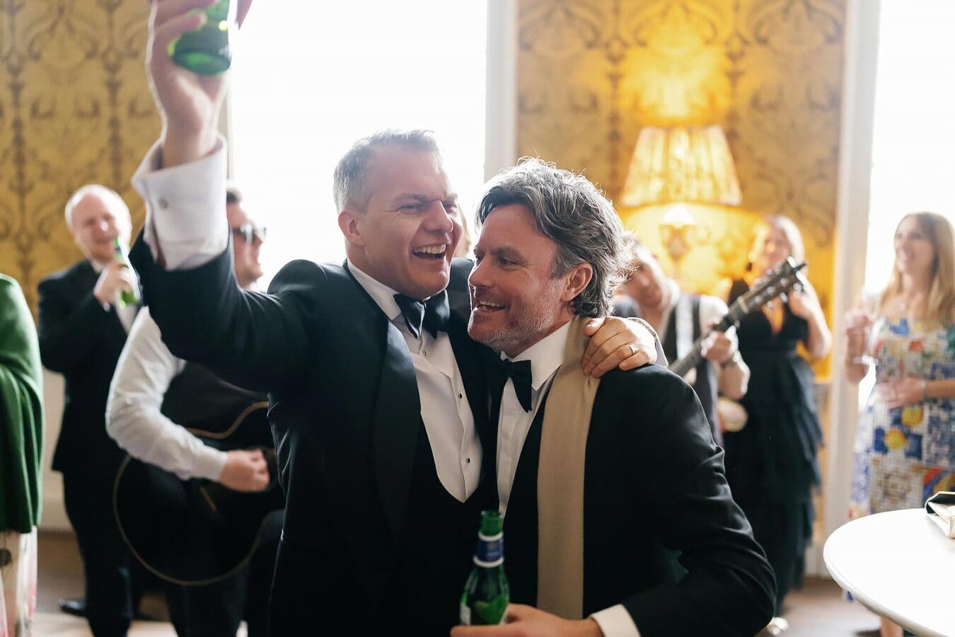 groom and best man dancing