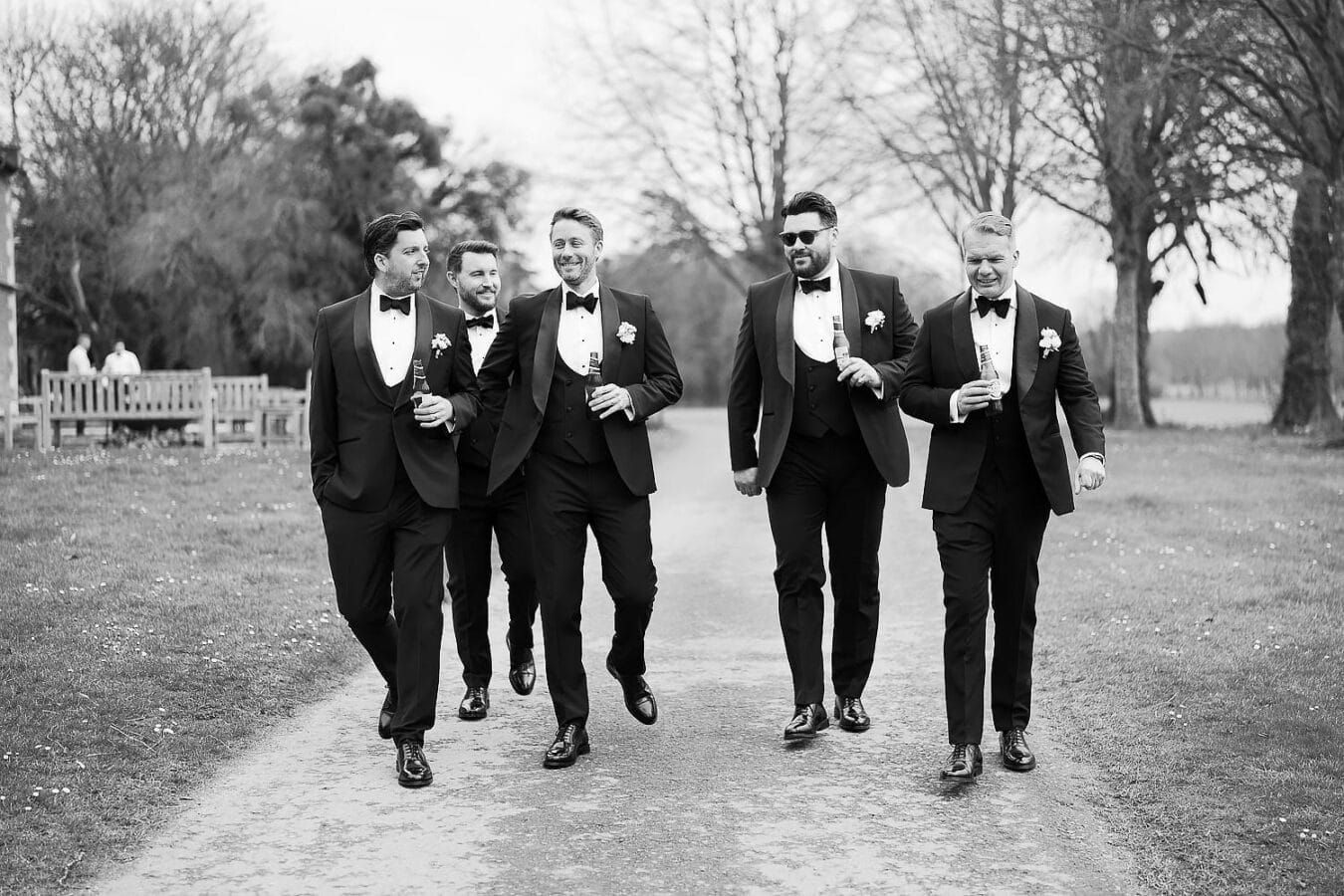 groomsmen walking to wedding venue