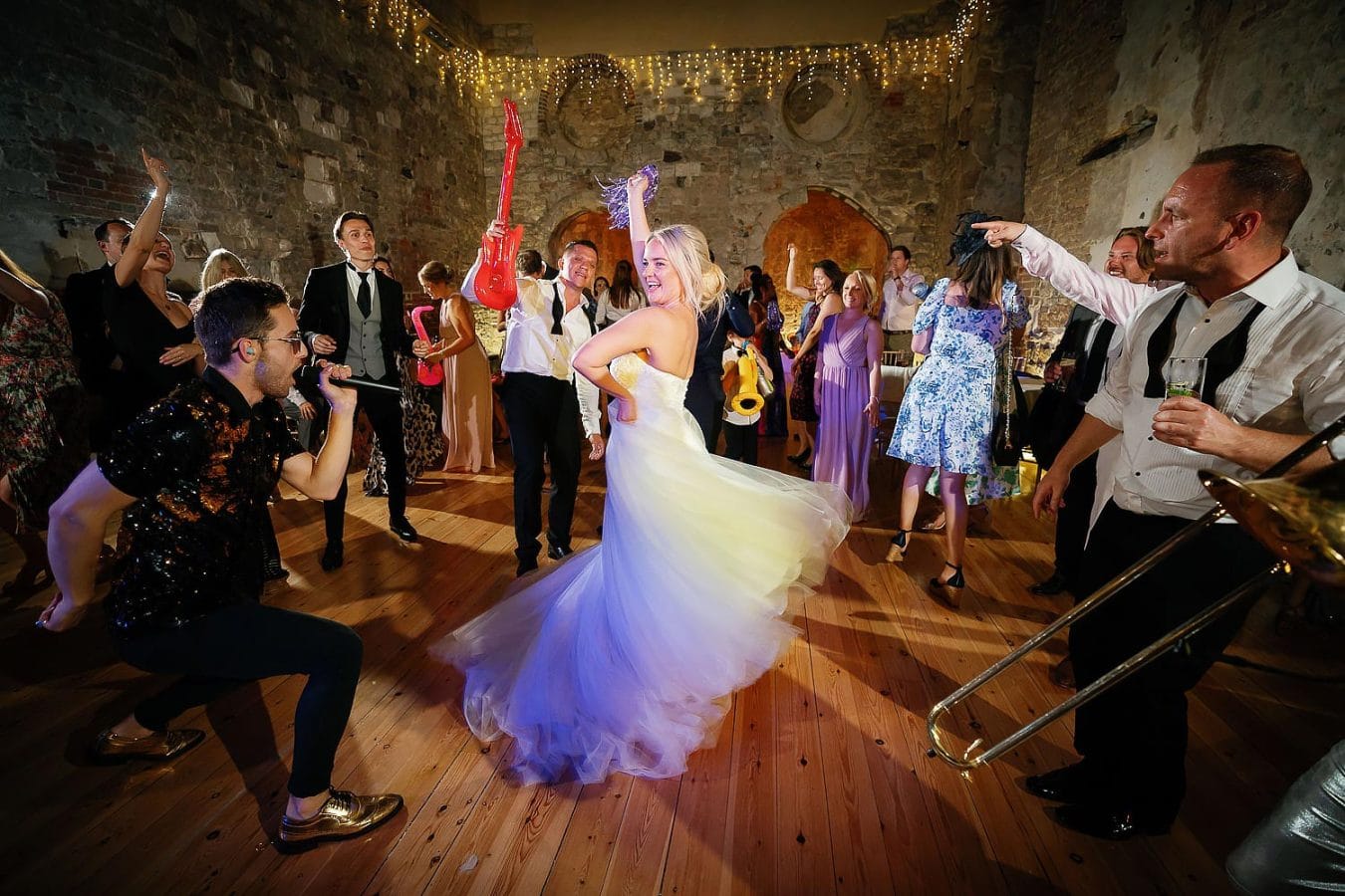 bride dancing inside lulworth castle