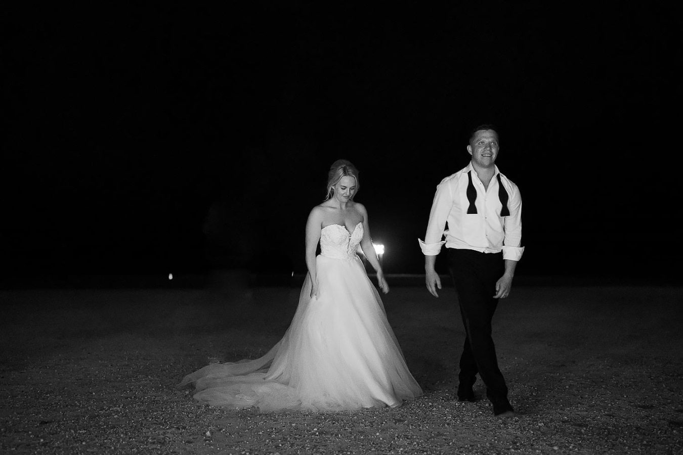 bride and groom at night