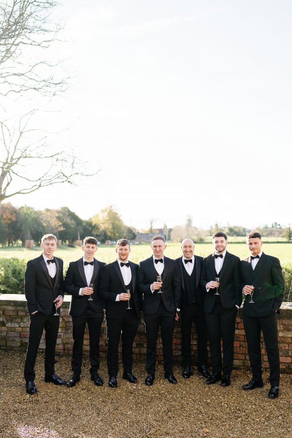 groomsmen photo outside Berkeley Castle