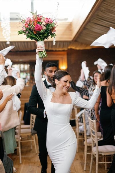 natural photo of bride dancing