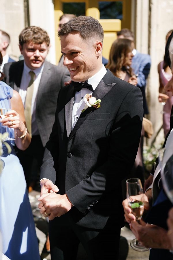 groom smiling