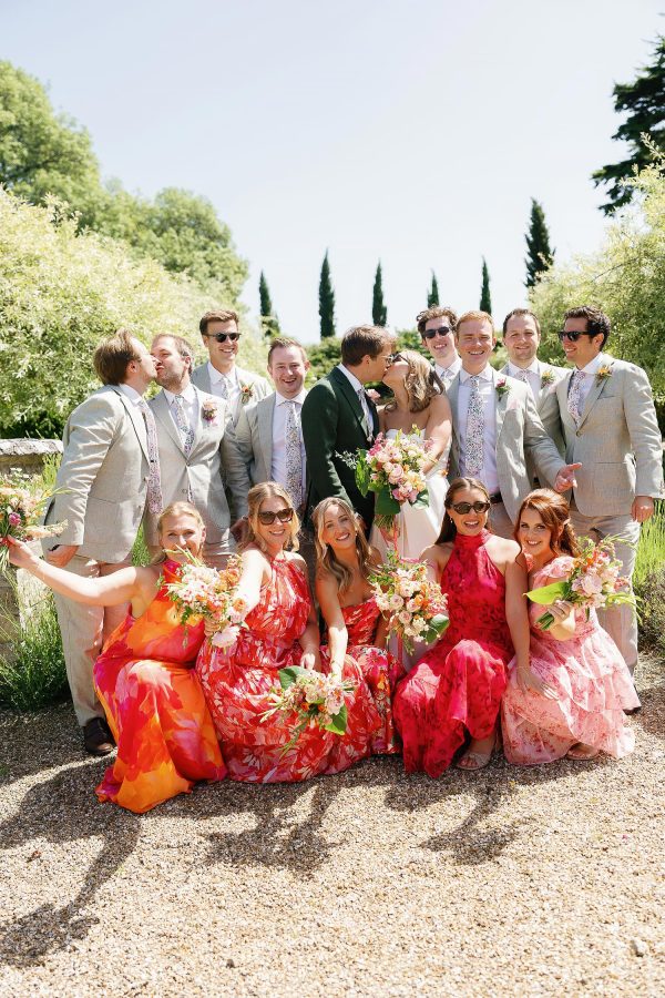 fun colourful wedding group photo