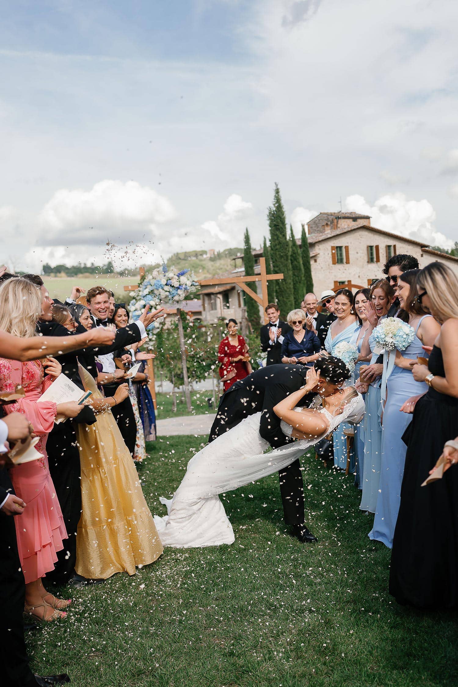 couple kissing after wedding ceremony